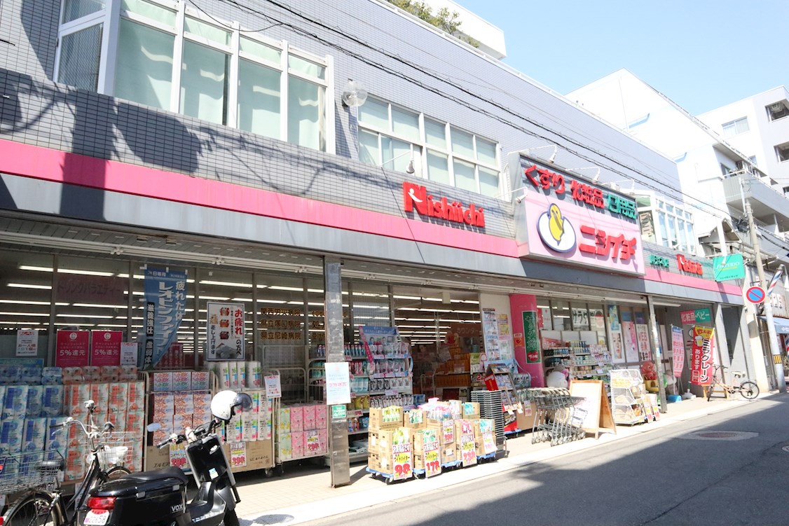 ドラッグストア：ﾆｼｲﾁ薬局 尾浜本店　495m